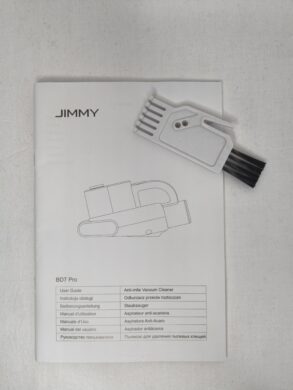 Reinigungsbürste mit Handbuch